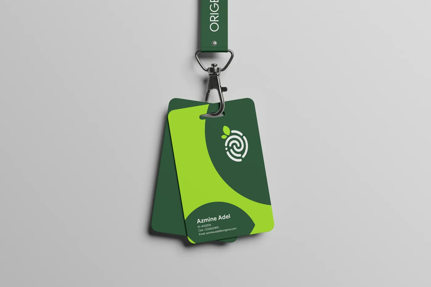 Origene staff ID card on a lanyard
