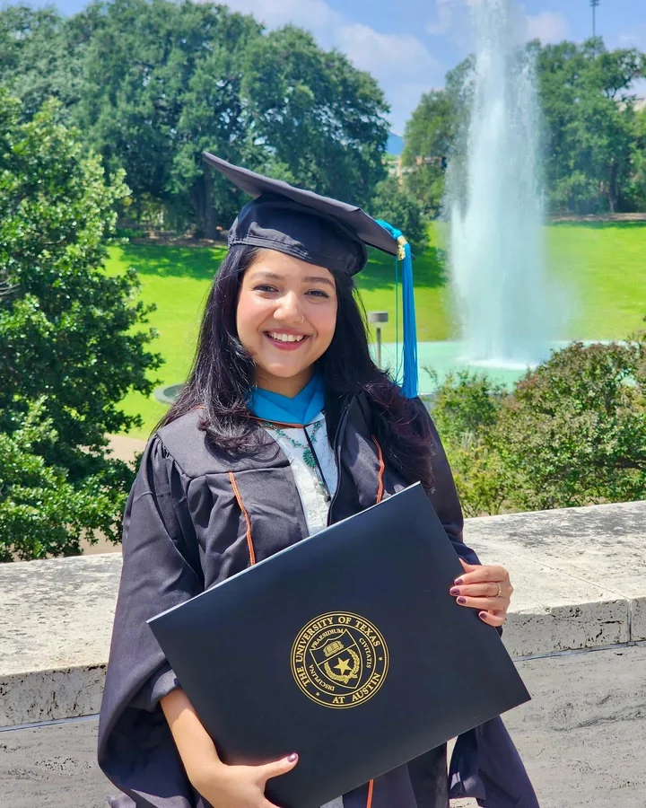 Mehzabeen Ahmad smiling at her graduation from The University of Texas at Austin