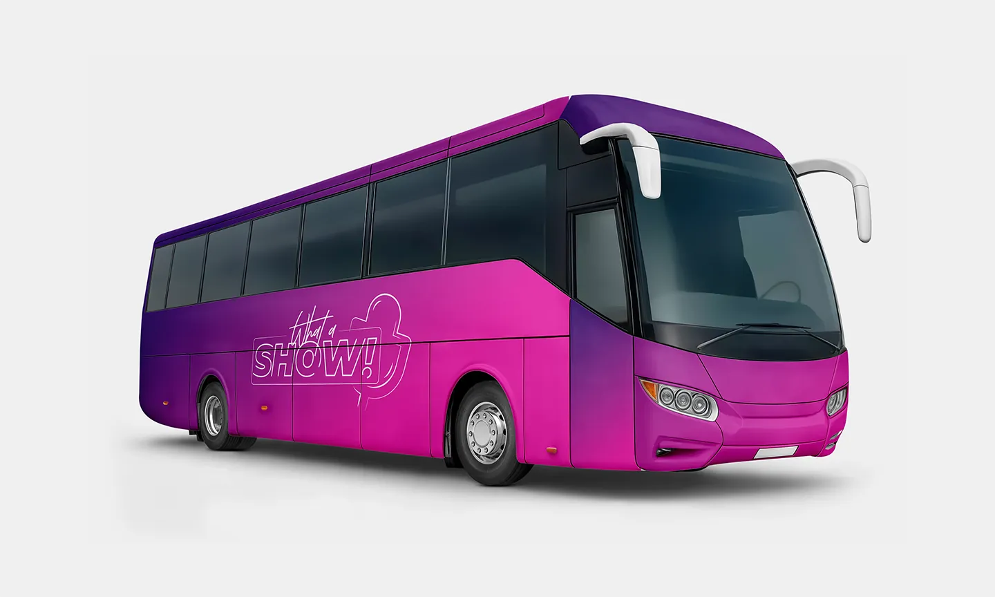 A tour bus wrapped in pink with the sign